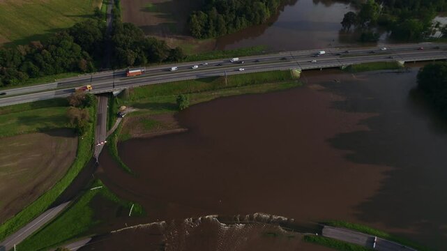 Katy Wroclawskie, Lower Silesia, Poland - September 19 2024: Aerial view of rising rivers threaten southern Poland near Wroclaw, A4 Autostrada Highway, Bystzryca river floods roads and villages