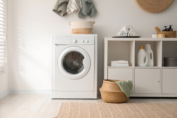 Washing machine, towels and detergents in laundry room