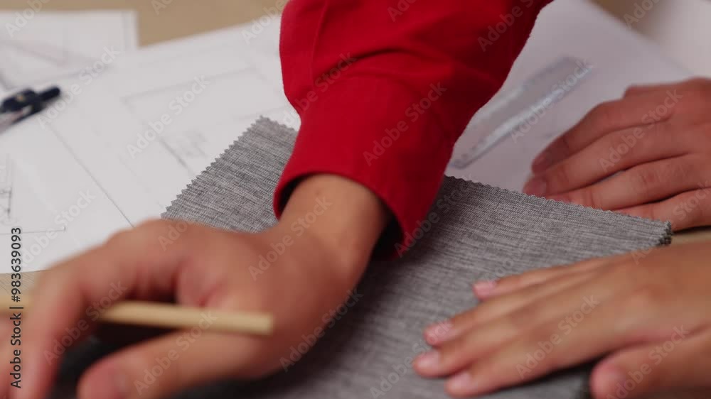 Poster slow motion hand closeup architect and interior designer presenting textile material and color from 