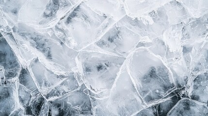 Gray Ice Texture. A close-up of ice with cracks and textures in various shades of gray.