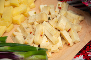 plate with cubes of spiced cheese in Transylvania, Romania, 2025,