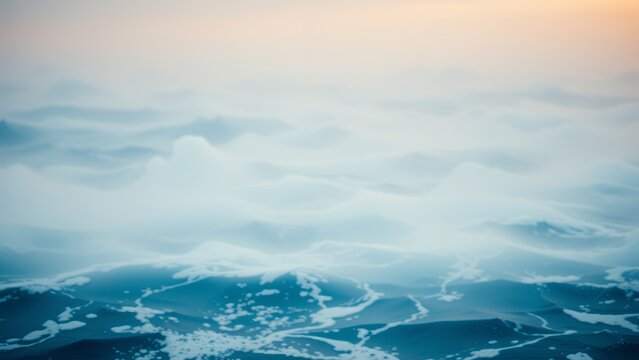 Abstract view of a misty sky with hints of blue.