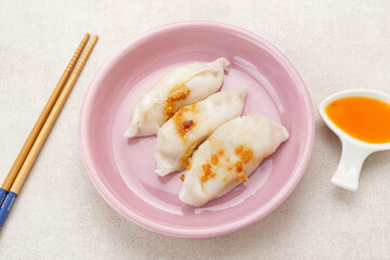 Choipan, made from rice flour filled with shredded jicama and sprinkled with fried garlic. Traditional steamed snack from Pontianak, Indonesia.
