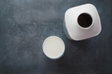 Enjoying Fresh Dairy Milk Served in a Glass on a Rustic and Charming Background Setting