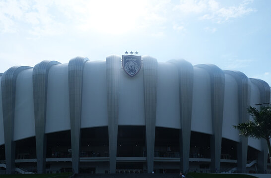 "Johor, Malaysia- Sept 14, 2024: A picture of JDT logo at Stadium Sultan Ibrahim during daytime and light from the back. Home of JDT Football Club.