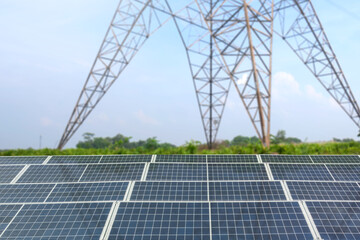 A solar panel or solar cell with high voltage electric transmission is shown on a cloudy day. The...