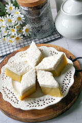 Malaysian Traditional Dessert known as Kuih Talam Pisang or Steamed Banana Cake.