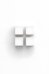 白い四角形が四つ並んだ画像