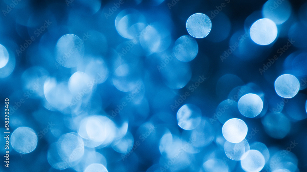 Poster abstract blue bokeh background with soft, blurred circles creating a calming atmosphere