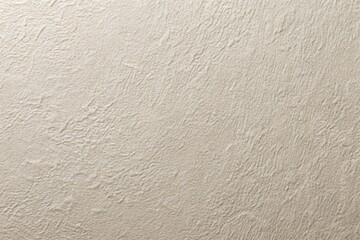 Close-up matte ceramic texture background with a rough pattern in light beige color for design concepts