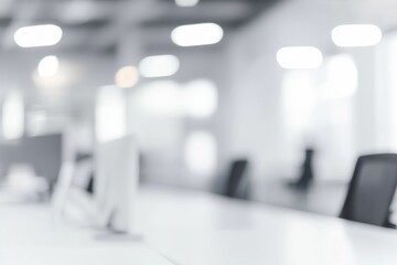 Minimalist office interior with blurred light and shadow, white tones, and bokeh effect, capturing a modern, bright, and abstract space with no visible people or equipment in focus.