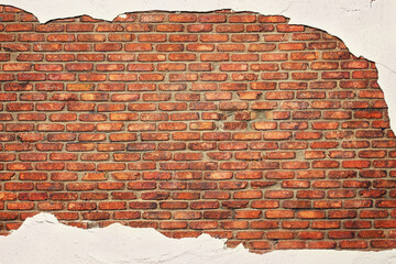 rustic brick wall with peeling concrete, texture of old stonework as background