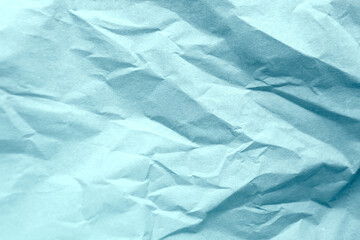 Pale colorful light blue tone color paint on recycled wrap blank paper texture background with space minimal style