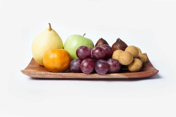 Assortment of exotic fruits isolated on white background. Close up of heap of fruit. Concept of healthy eating and dieting lifestyle. 