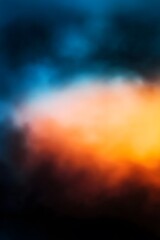 Blue orange and black gradient background blurred