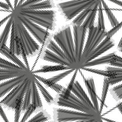 Modern halftone palm leaf seamless pattern in black and white for stylish textile design