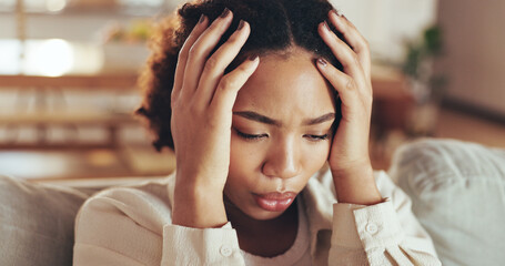 African, woman and stress with depression at house for financial news, headache and anxiety...