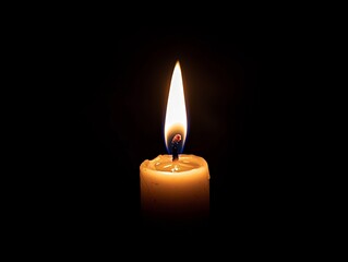 A single candle flame flickering in the darkness, casting a soft glow in an otherwise dim room