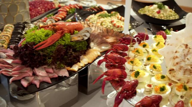 buffet table different dishes are on the table