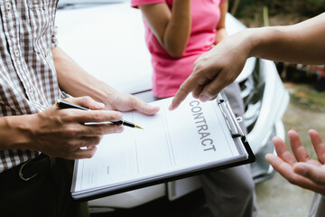 Asian woman involved in car accident, insurance agent and expert analyze the incident to seek compensation, while disgruntled driver argues over the damages caused.