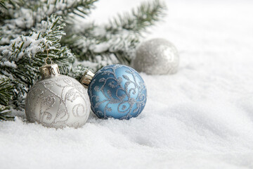 Snowy Christmas Tree Decorated with Frosty Baubles and Snow
