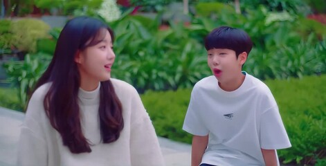 A Korean teenage boy runs enthusiastically towards his crush, slips, and ends up sitting behind her