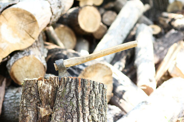 man chopping wood with an ax