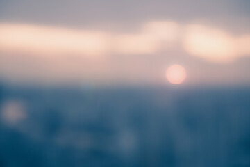 Golden hour blured cloudy sky with city rooftop view blur background, cityscape business office...