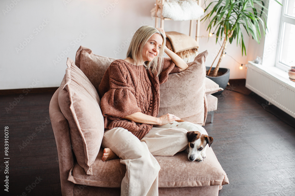 Poster Cut Middle aged Woman sitting on couch at home