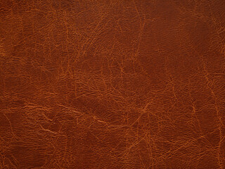 Close-up of Genuine Brown Leather Texture with Design Lines - Ideal for Luxury Backgrounds or Upholstery Design
