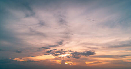 Obraz premium 4k Aerial of Cloud with sunset sky background in Thailand,Cloudscape time lapse background Dark red purple sunset sky Nature background, sunset in the clouds