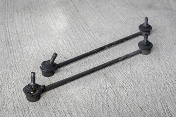 Close-up of worn out ,broken car front stabilizer sway bar link.	