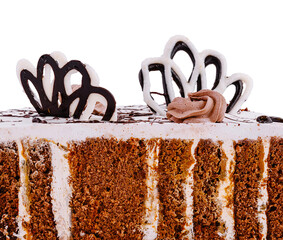 Delicious chocolate cake slice decorated with chocolate cream flowers