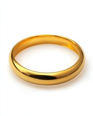 A close-up of a gold bangle, isolated on a white background for a clean, stock image look