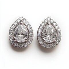 A pair of diamond earrings displayed alone, isolated on a white background for an elegant stock image