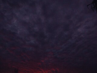 Landono-Indonesia, 19 Septmber 2024: evening sky view with red sun rays
