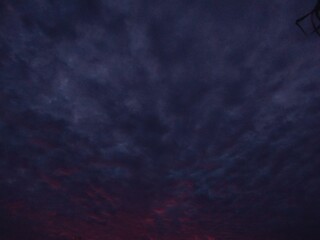 Landono-Indonesia, 19 Septmber 2024: evening sky view with red sun rays
