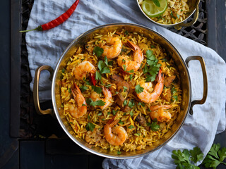 Pondicherry prawn biryani (Inspired by the spice abundant south, this exotic combination of spiced prawns and fish layered with herbs and fragrant basmati rice guarantees a burst of flavors)

