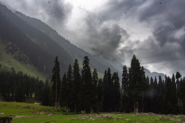 time lapse of clouds over the mountain