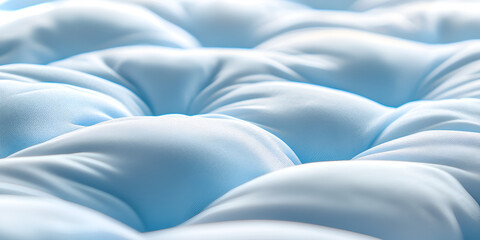 This is a 3D rendering of a soft white mattress on a blue background The mattress is clean and new and it looks very comfortable.