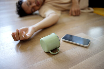 Man Passing Out Accident Fainting and Falling on Floor at Home Caused by Hypotension ,or heart...