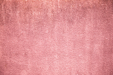old wall background rough grain grungy plaster texture surface peach terracotta pink persimmon