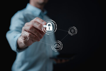 Key unlock Business man holding and managed his cybersecurity and privacy to protect data by key icon holographic technology. protecting personal data on virtual interfaces, keys to successful