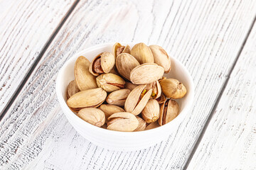 Salted tasty pistachio nuts heap