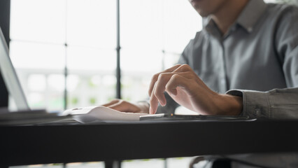 Business man accountant financial analyst and auditor working and laptop for calculating 