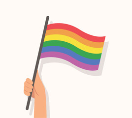 Hand holding rainbow flag. vector illustration