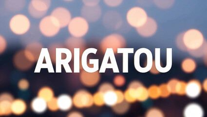 arigatou lettering on blurred lights bokeh background