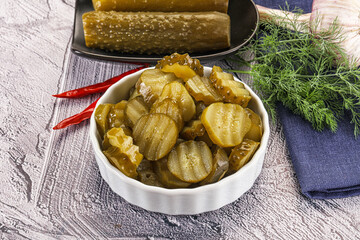 Sliced marinated cucumbers in the bowl