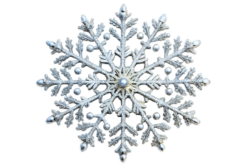 Close-up of silver snowflake decoration with glitter