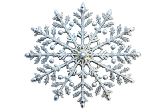 Close-up of silver snowflake decoration with glitter